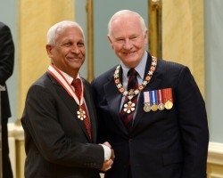 Mannar receives the Order of Canada from Governor General David Johnston at Rideau Hall in Ottawa on May 3 in recognition of his leadership in the global fight against malnutrition and micronutrient deficiency. Photo credit: Sgt. Ronald Duchesne 