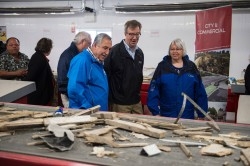 Ottawa Mayor Jim Watson, centre, takes a tour of Tomlinson’s new waste recovery centre in Carp at the community opening event on June 11. He is joined by Councillors Eli El-Chantiry and Marianne Wilkinson.