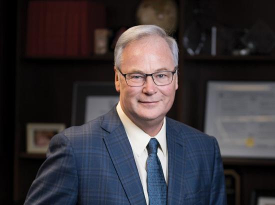 Gone fishin’— The Ottawa Hospital’s Dr. Kitts proudly reflects back
