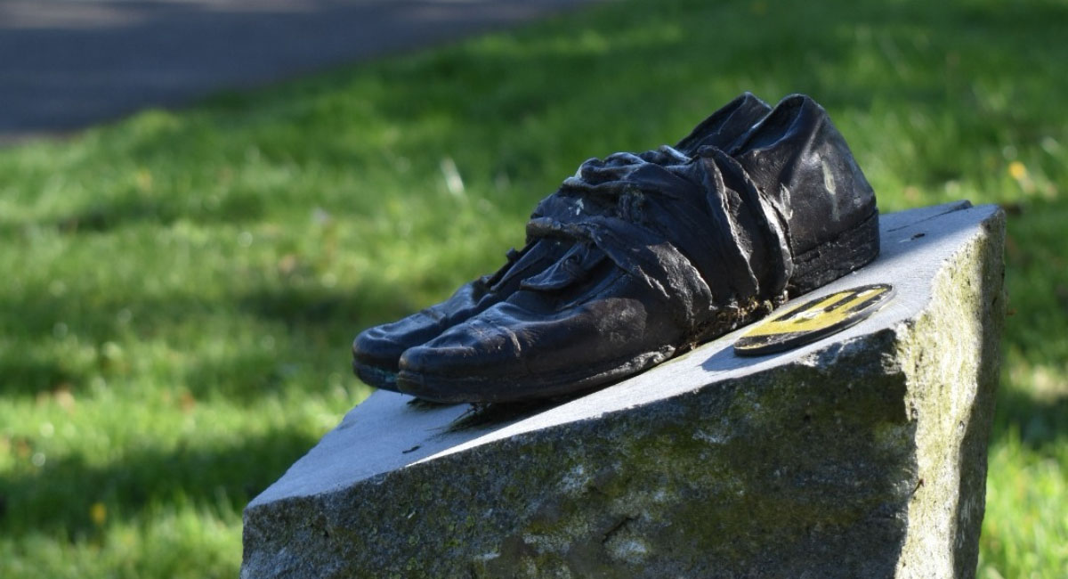 Bronze shoes on the National Famine Way, Ireland.
