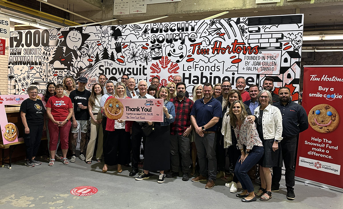 The Snowsuit Fund received a cheque from 2025 Smile Cookie campaign